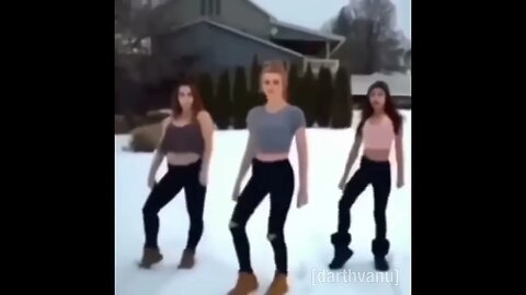 women dancing outside snow