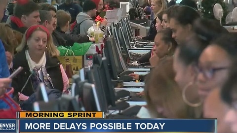 DIA trying to recover after hundreds of flight cancellations