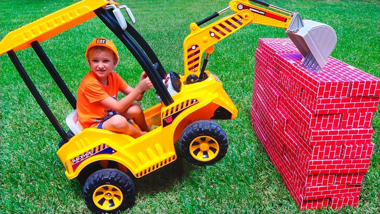 Tractor breaks down the walls - Vlad ride on power wheel to help kid