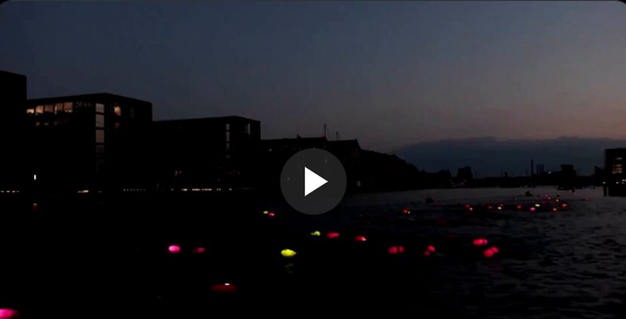 A sea of glowing buoys lit up Copenhagen’s night as 4,500 swimmers participated...