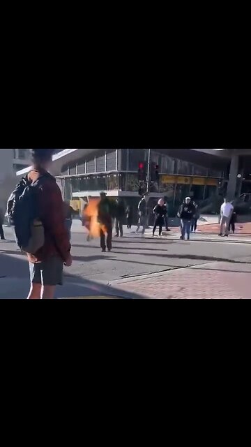 People Try To Extinguish Man On Fire, One Guy Hits Him With A Bike? - HaloRockNews