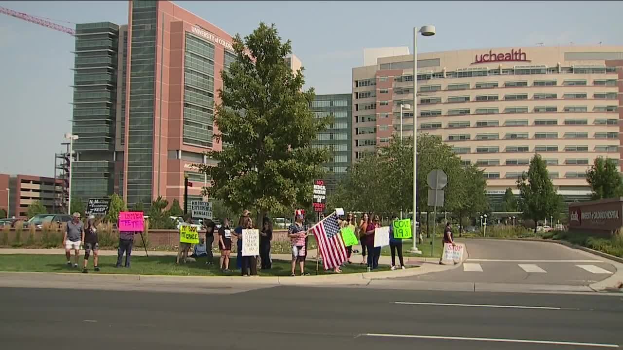 Colorado health care workers protest vaccine mandates as a condition of employment