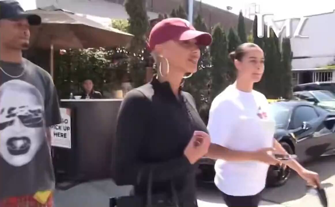 Amber Rose lashes out at a TMZ reporter, declaring, "We are voting for Trump”
