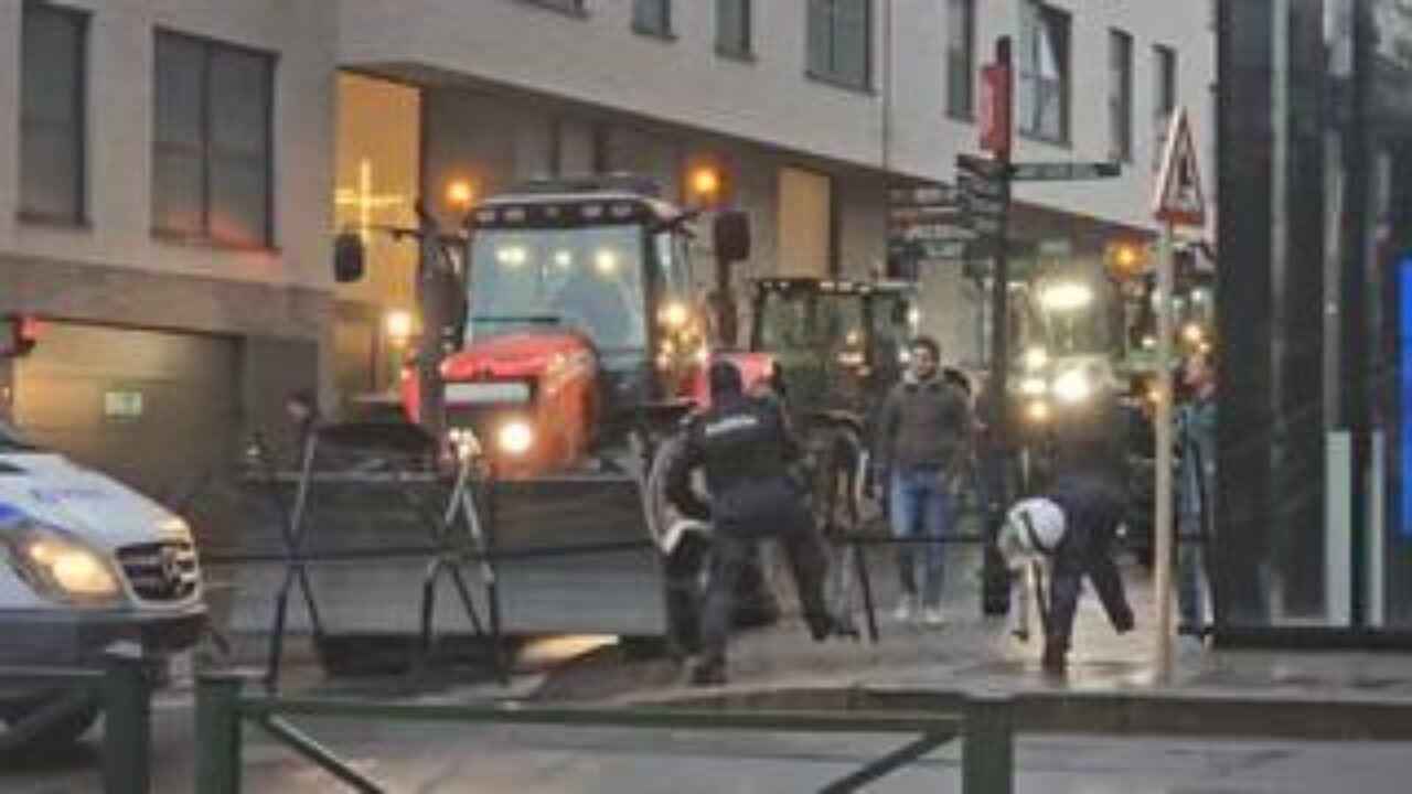 Farmers break through police roadblocks in Brussels.