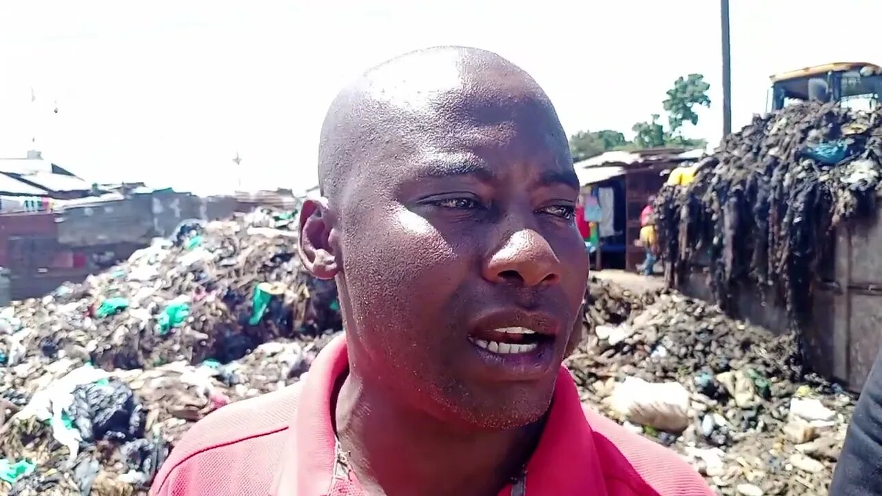 Cleaning Nakiwogo waste collection centre