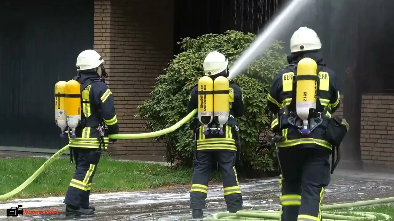 10. Smoke billows from thatched cottage fire