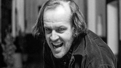 Jack Nicholson walking on the set of The Shining