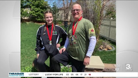 Father swears in daughter to Nebraska Army National Guard