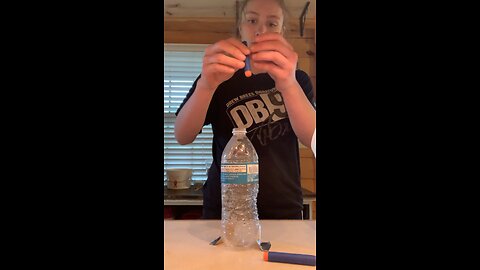 Cool nerf dart flip into plastic bottle👍🏻 #bottle #flip #nerf