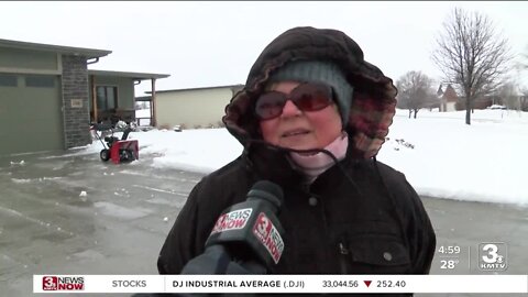 Omaha residents spend Thursday cleaning up slush and snow
