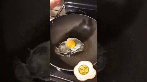 Cracking an egg on a hot pan 🍳