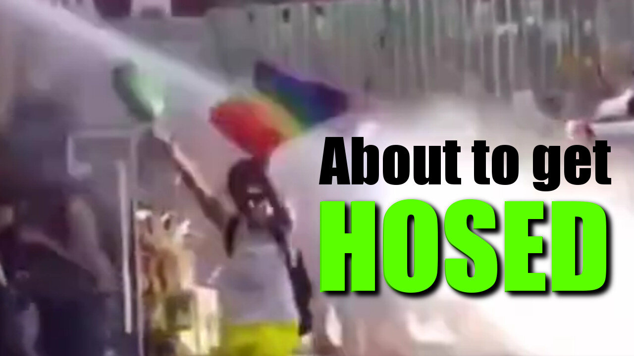 Pride parader gets hosed