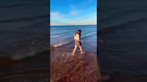 Walking through the ocean in crocs