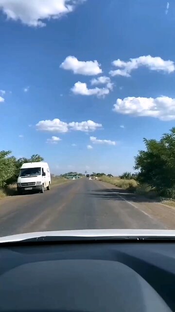 Attack Helicopter low pass over road