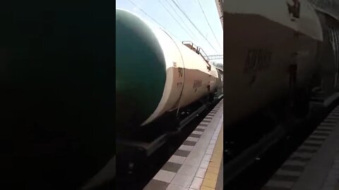 Freight Train Through Passenger Terminal Russia