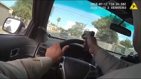 Body cam shows officers in pursuit of vehicle, shots are fired