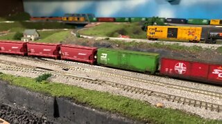 N Scale Dash 8s pull onto the main after a meet up.