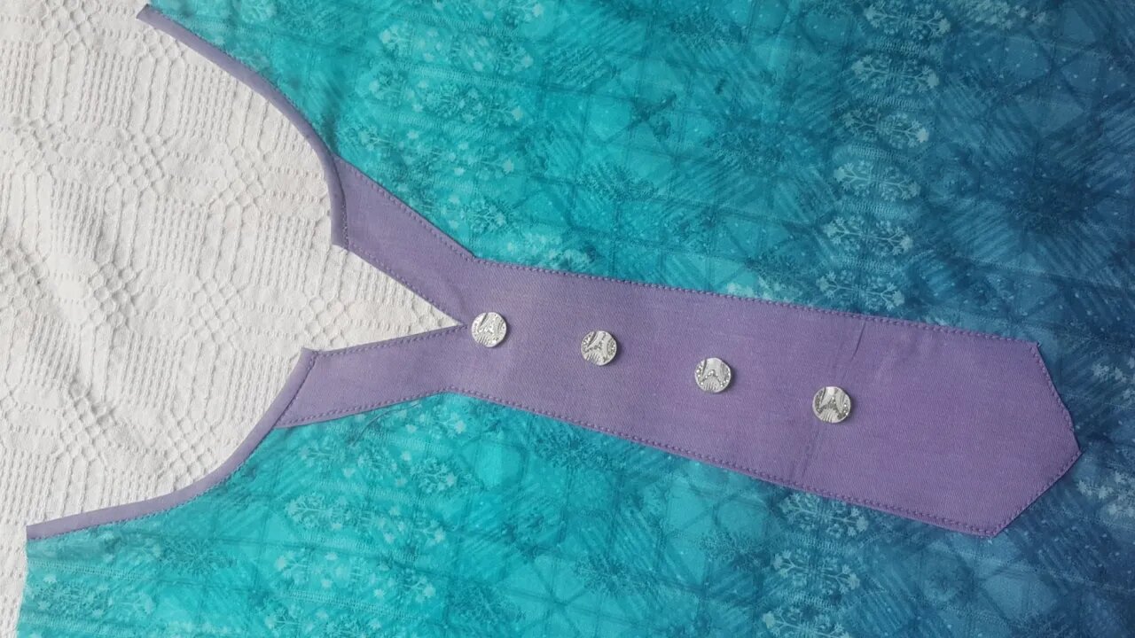 V placket neck cutting and stitching.