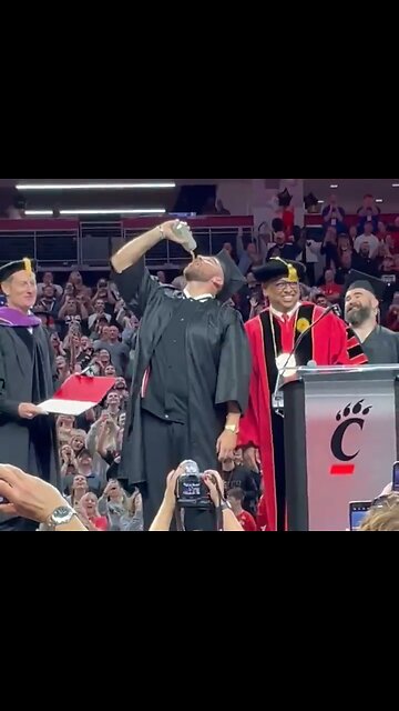 Travis Kelce Receives A Diploma Stone Cold Steve Austin Style