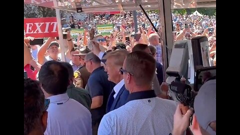 Someone Hands Trump A Pork Chop At Iowa State Fair