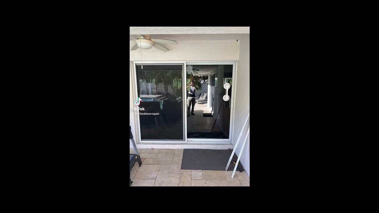 Hurricane impact sliding glass door repair; roller replacement and track refurbishing
