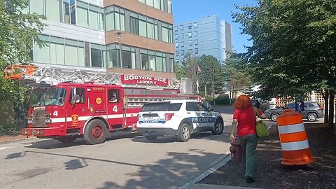 Boston police and EMS takedown possible jumper from garage