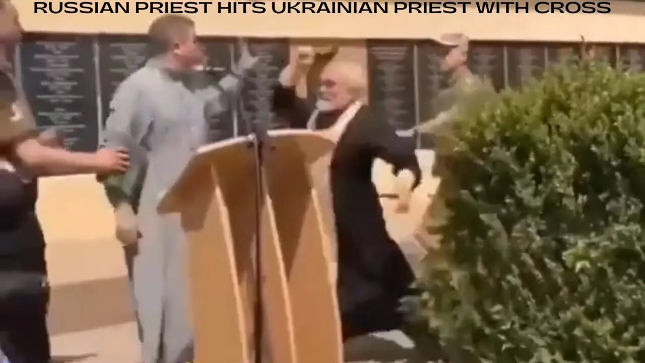 Russian priest hits ukrainian priest with cross