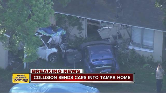 Collision sends cars into Tampa home