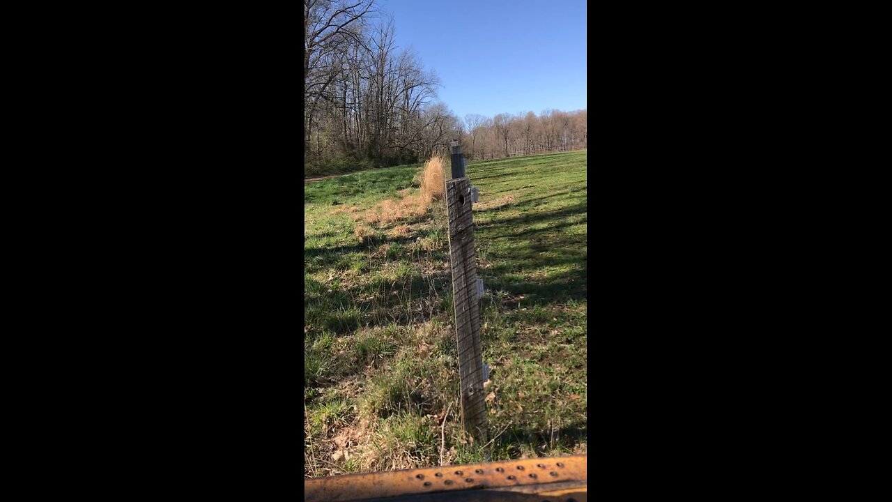 Husband takes down fence with his skid steer