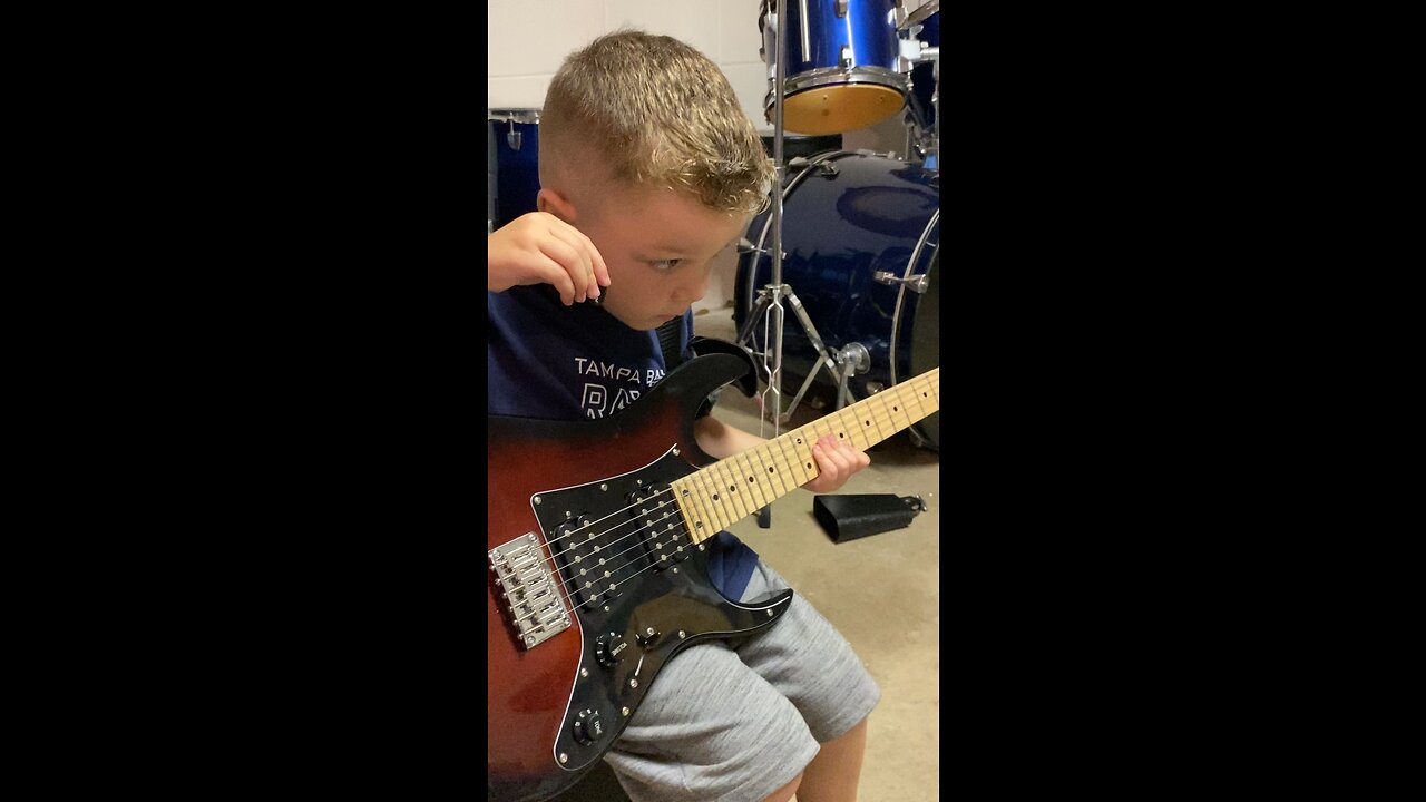 My 3 year old playing the guitar