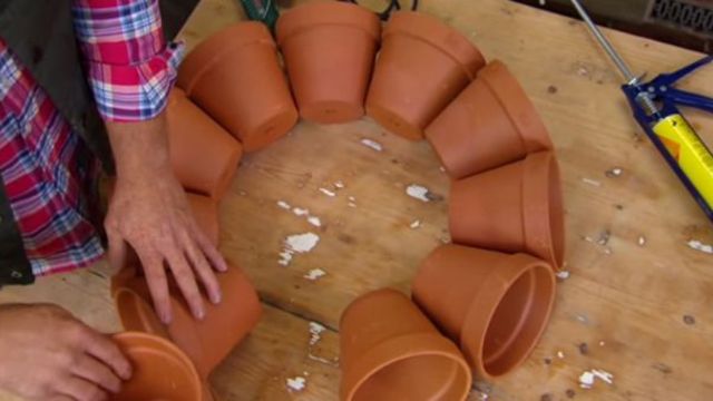 creates some funky terracotta garden art