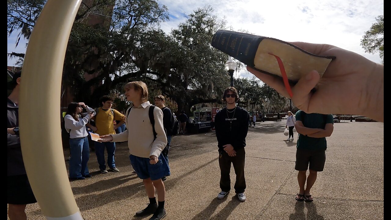 UF: A Small Crowd of About 8-9 Students Gathers Around As I Minister To A Skeptic & An Atheist, Then I Minister To A Buddhist, Exalting Jesus Christ