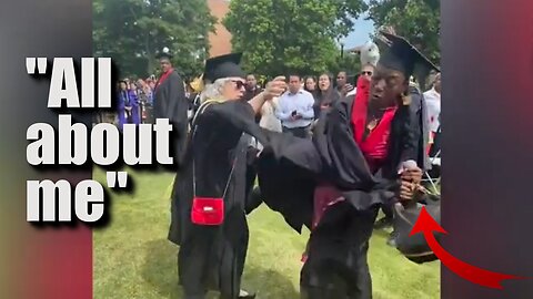 Black grad grabs mic from white faculty member