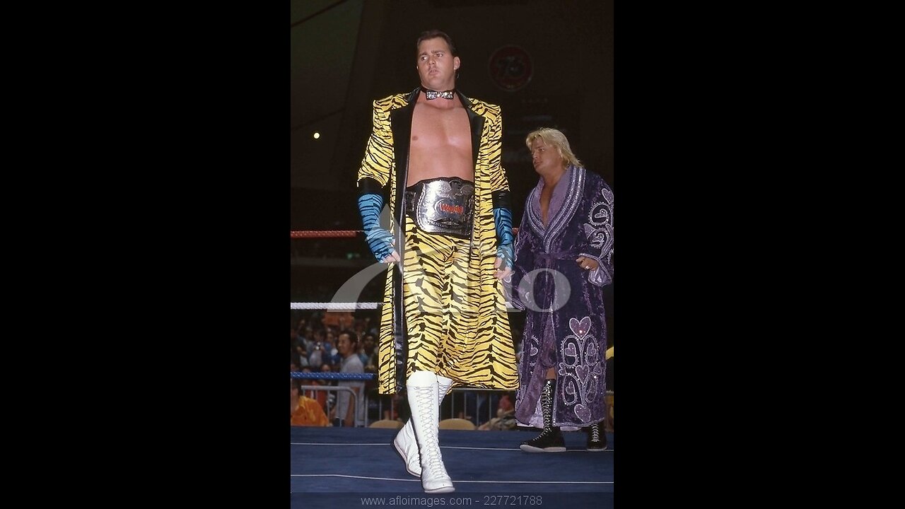 Brutus beefcake in pink tights with black stripes