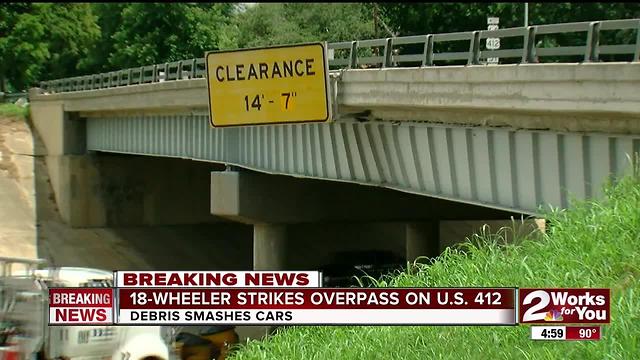 18-Wheeler strikes overpass on Crosstown Expy.