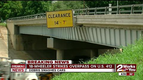 18-Wheeler strikes overpass on Crosstown Expy.