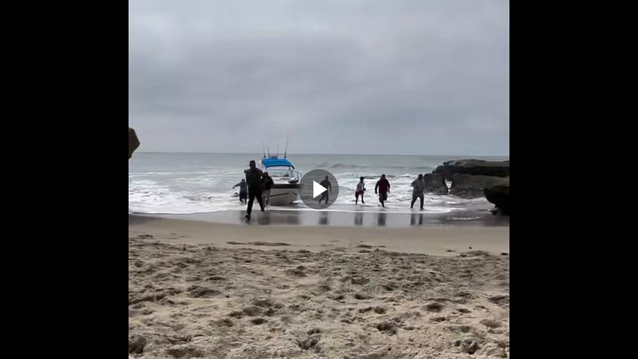 NEW: Nearly a dozen illegal immigrants storm the beach in broad daylight....