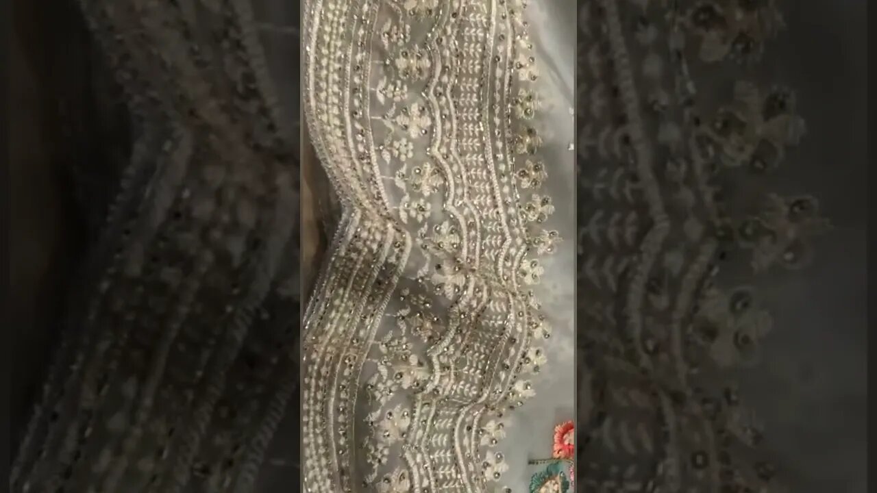 Organza fabric Resham embroidery with Swarovski and katdana work saree