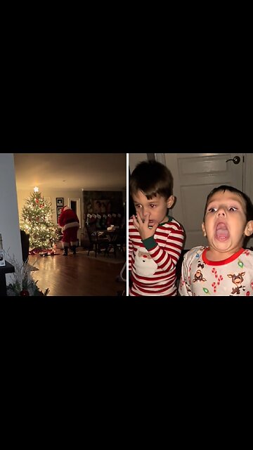Excited Kids "Caught" Santa Putting Presents Under The Christmas Tree