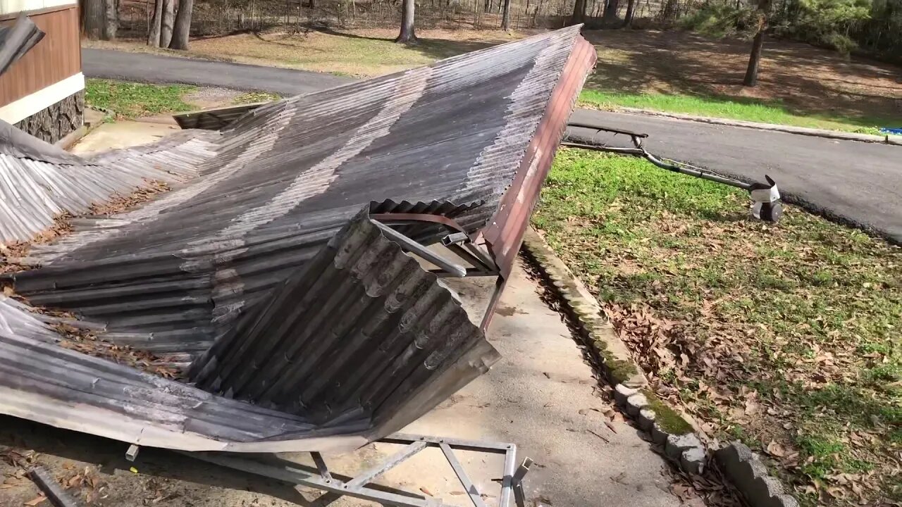 Got one carport down and cut up