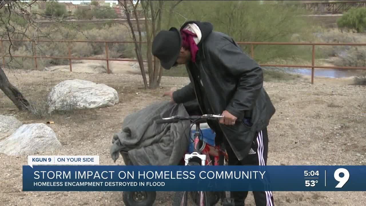 Homeless encampments destroyed by flooding in the wash