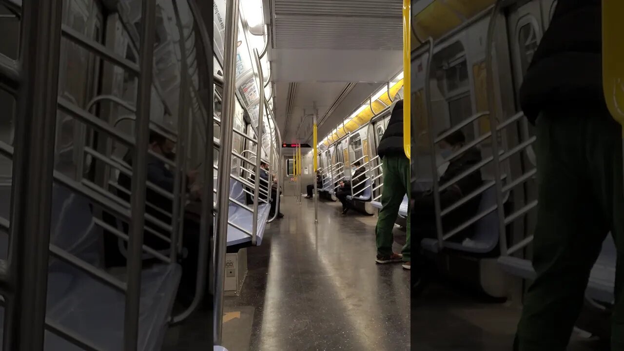 R train uptown in New York City 2021.