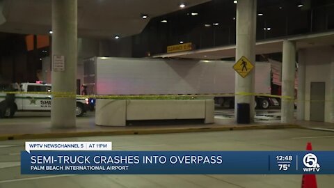 Semi smashes into elevated crosswalk at PBIA