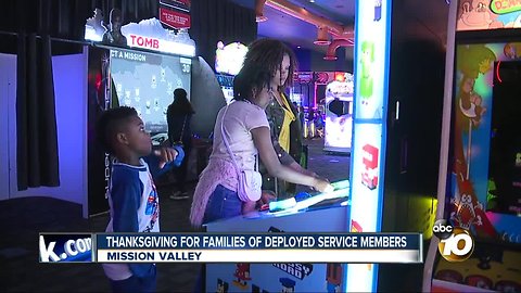 With spouses deployed, military families get arcade style Thanksgiving