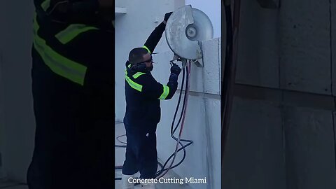 Cutting a Wall with a 20 inch Handsaw.