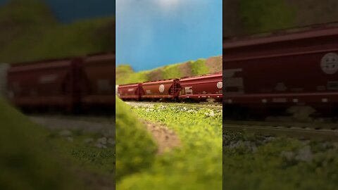 N Scale grain train on a mountain pass