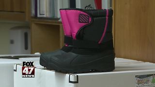 Operation Boots on the playground provides boots to kids