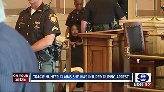 Tracie Hunter claims injury after being dragged from court