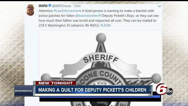 Group collecting patches to make quilt for Deputy Pickett's children