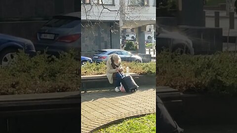 old man chilling with music from phone